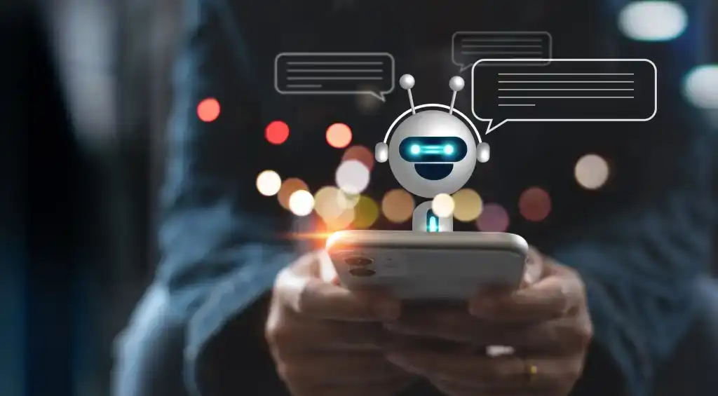 Man holding a phone talking to an AI chatbot 