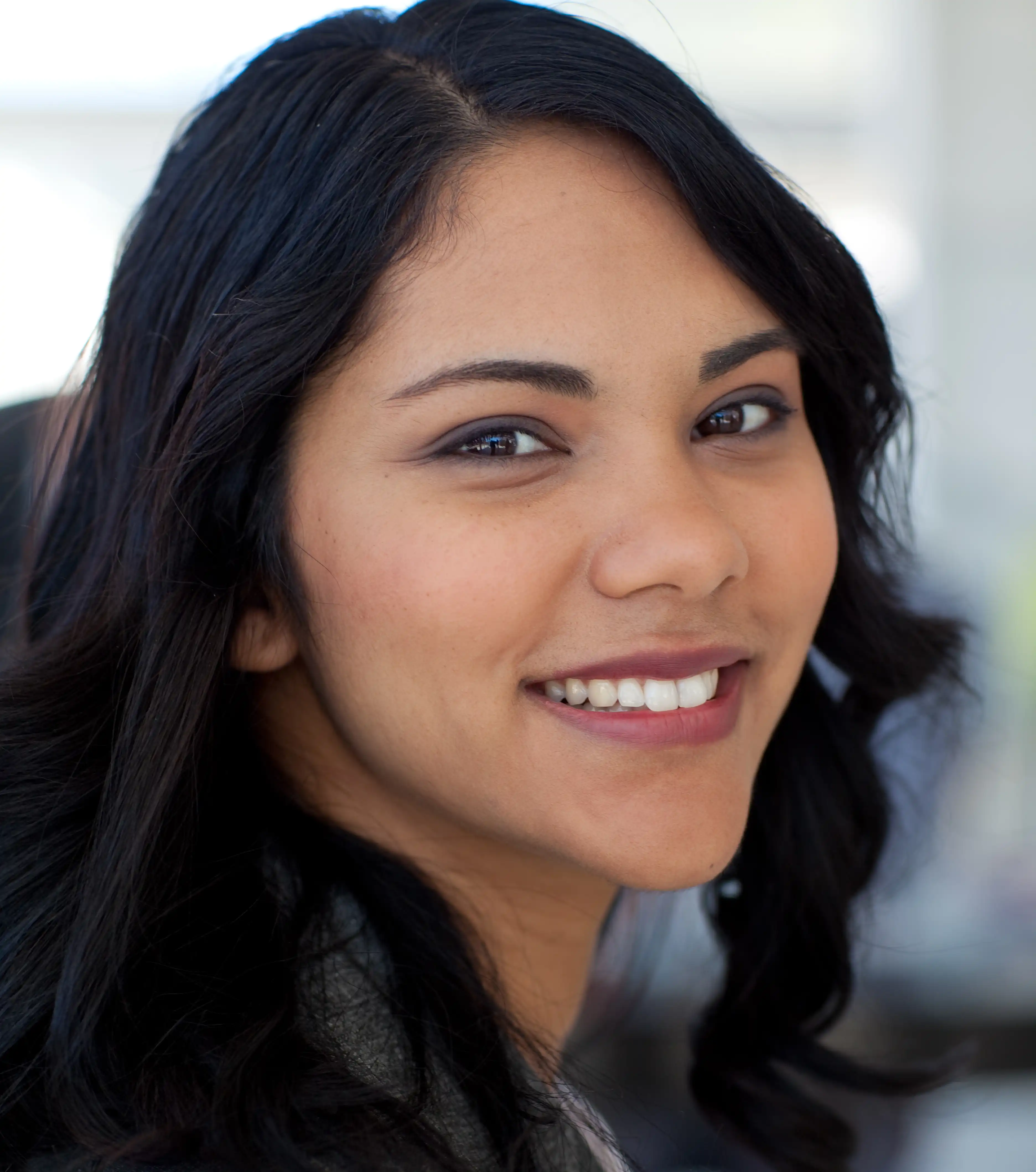 Professional woman wearing grey suit