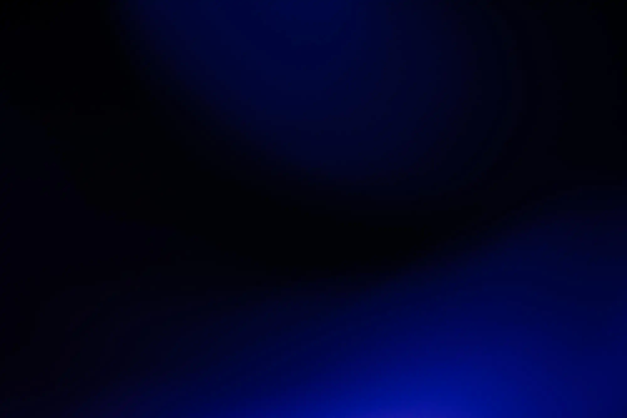 dark black and blue blur background