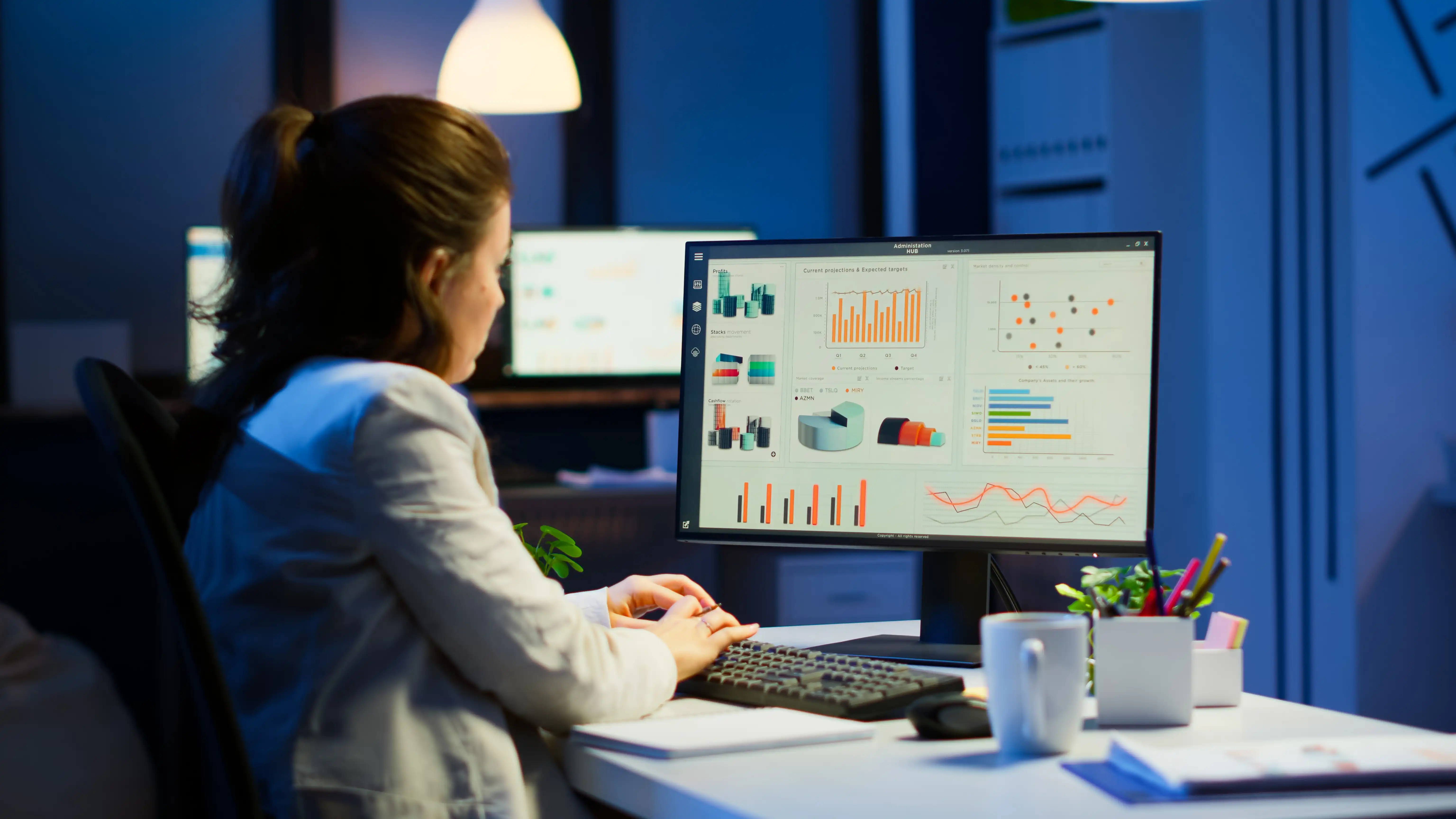 Women on computer reviewing data