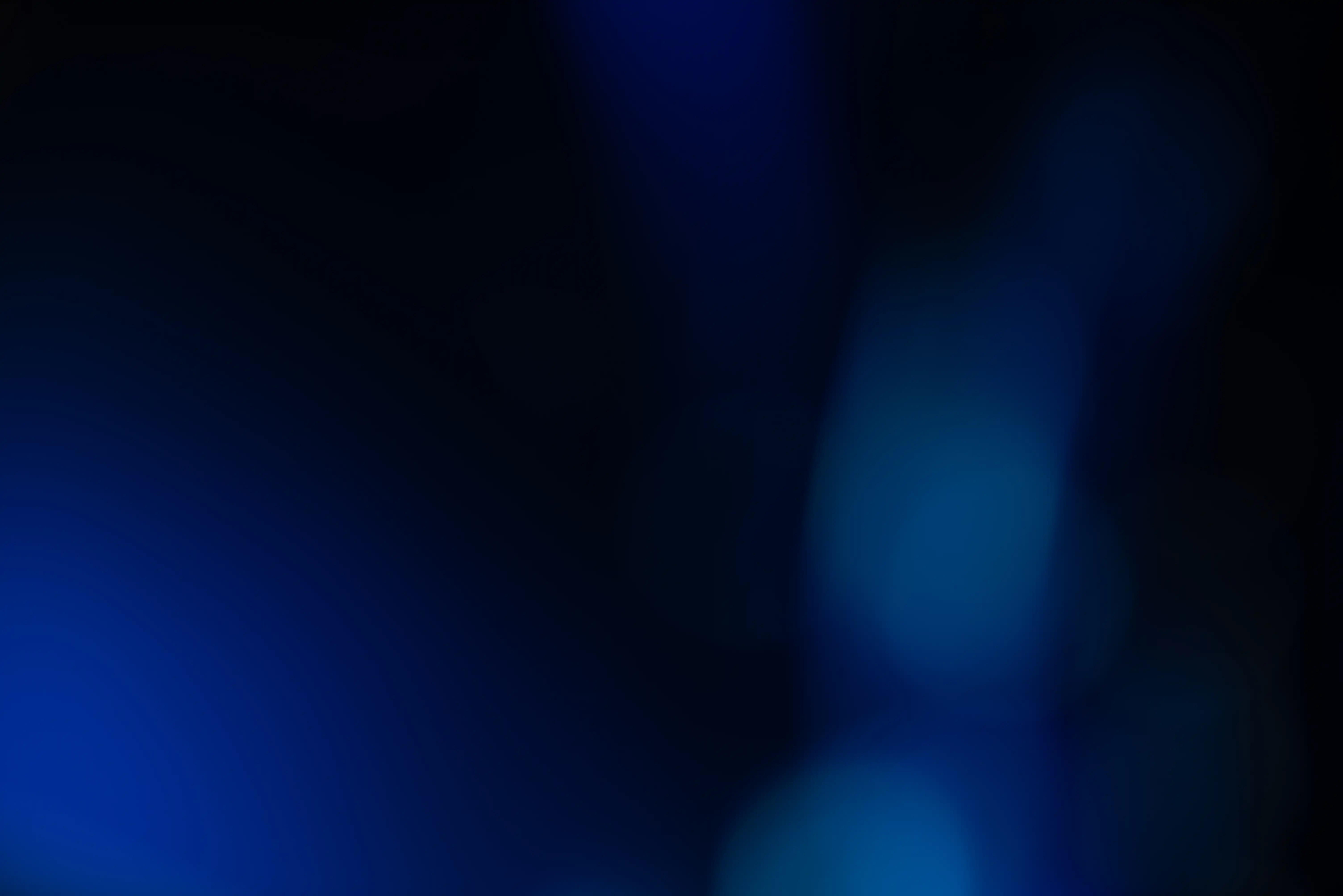artistic blurry blue and black background