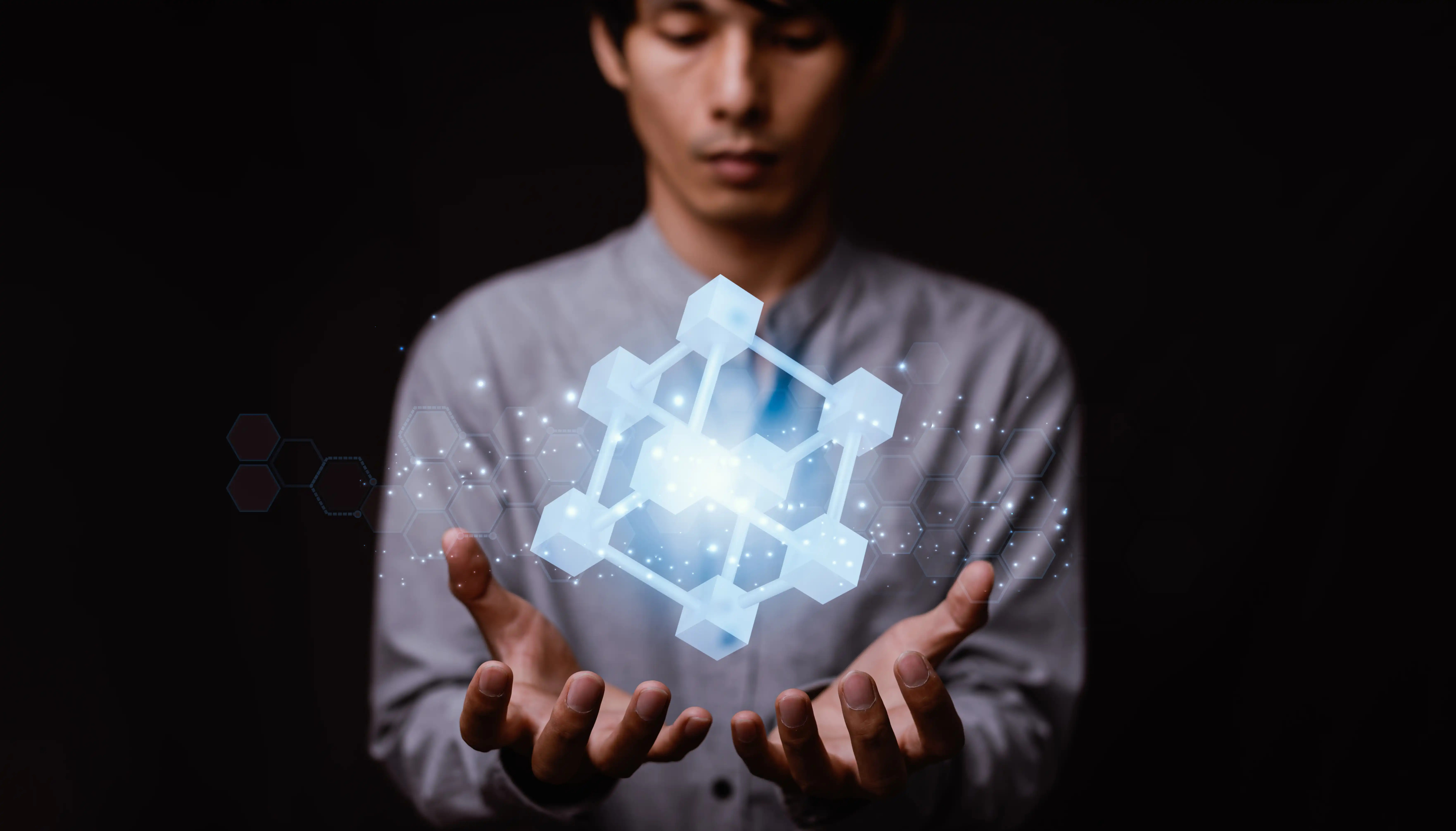 A man holding a block grahic.