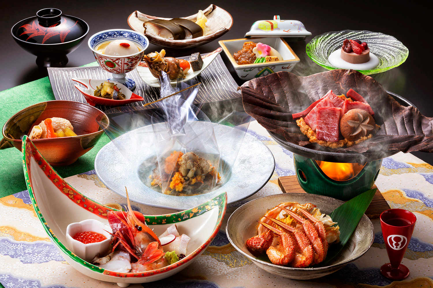 An elaborate multi-course Kaiseki meal featuring diverse dishes, including fresh seafood, premium beef, and seasonal vegetables, presented artfully.