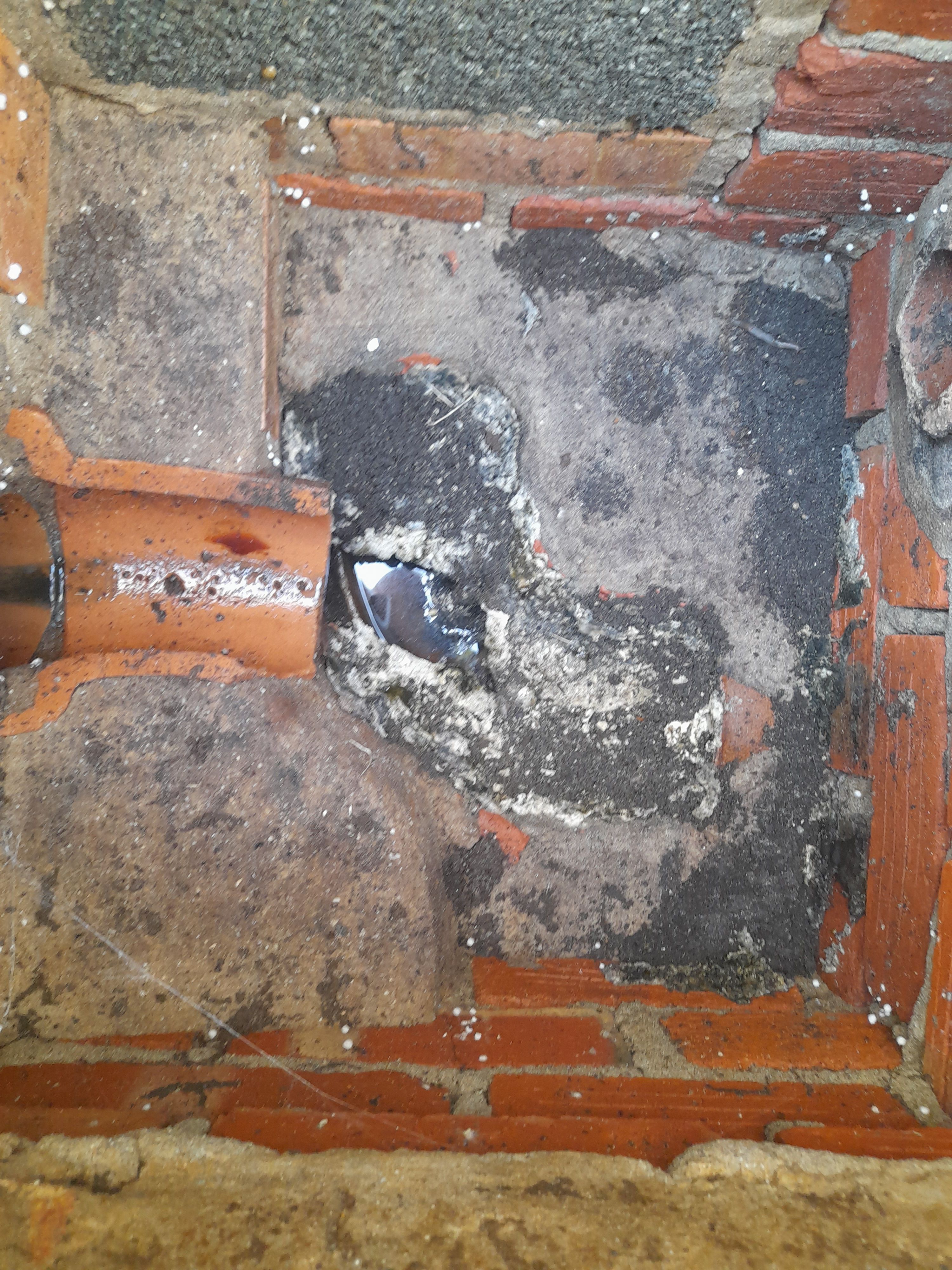 Working on pipes in the ground outdoors