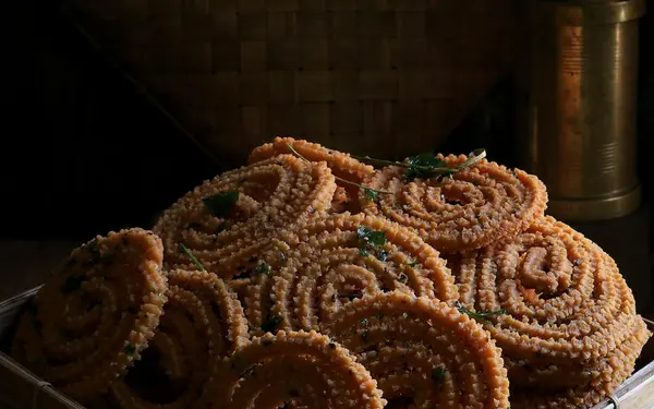 Traditional South Indian murukku — spiral-shaped, golden, and crispy