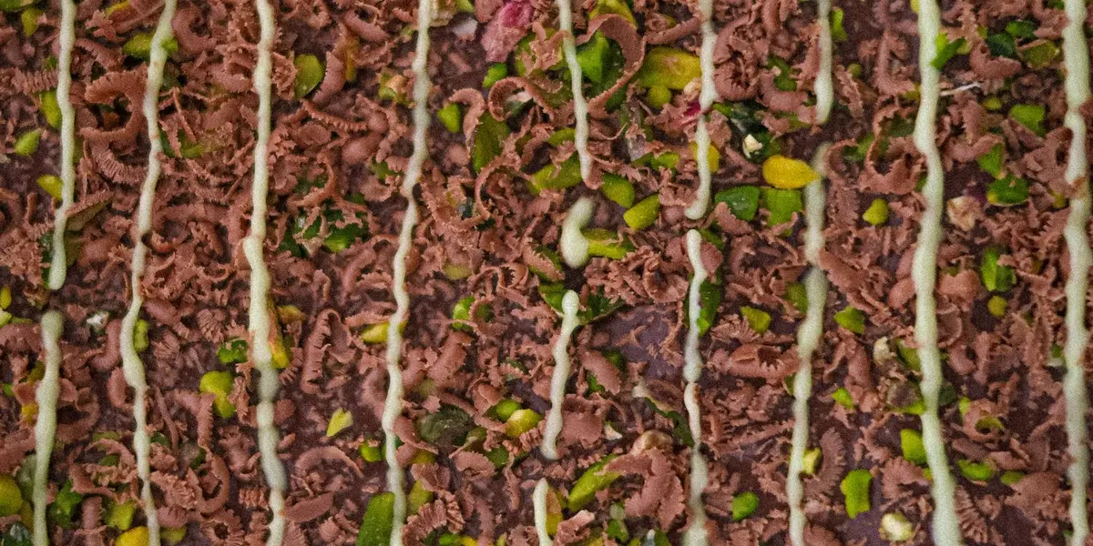 Close-up of pistachio kunafa chocolate texture — the viral Dubai chocolate format