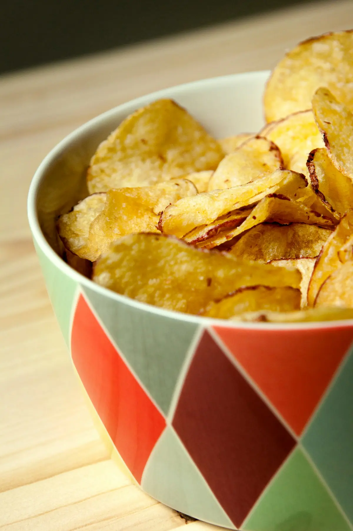 Regular potato chips in a bowl for comparison
