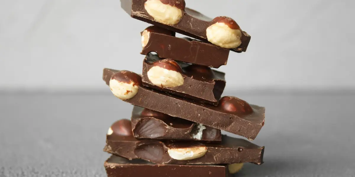 Stacked premium chocolate bars representing retail stock and inventory