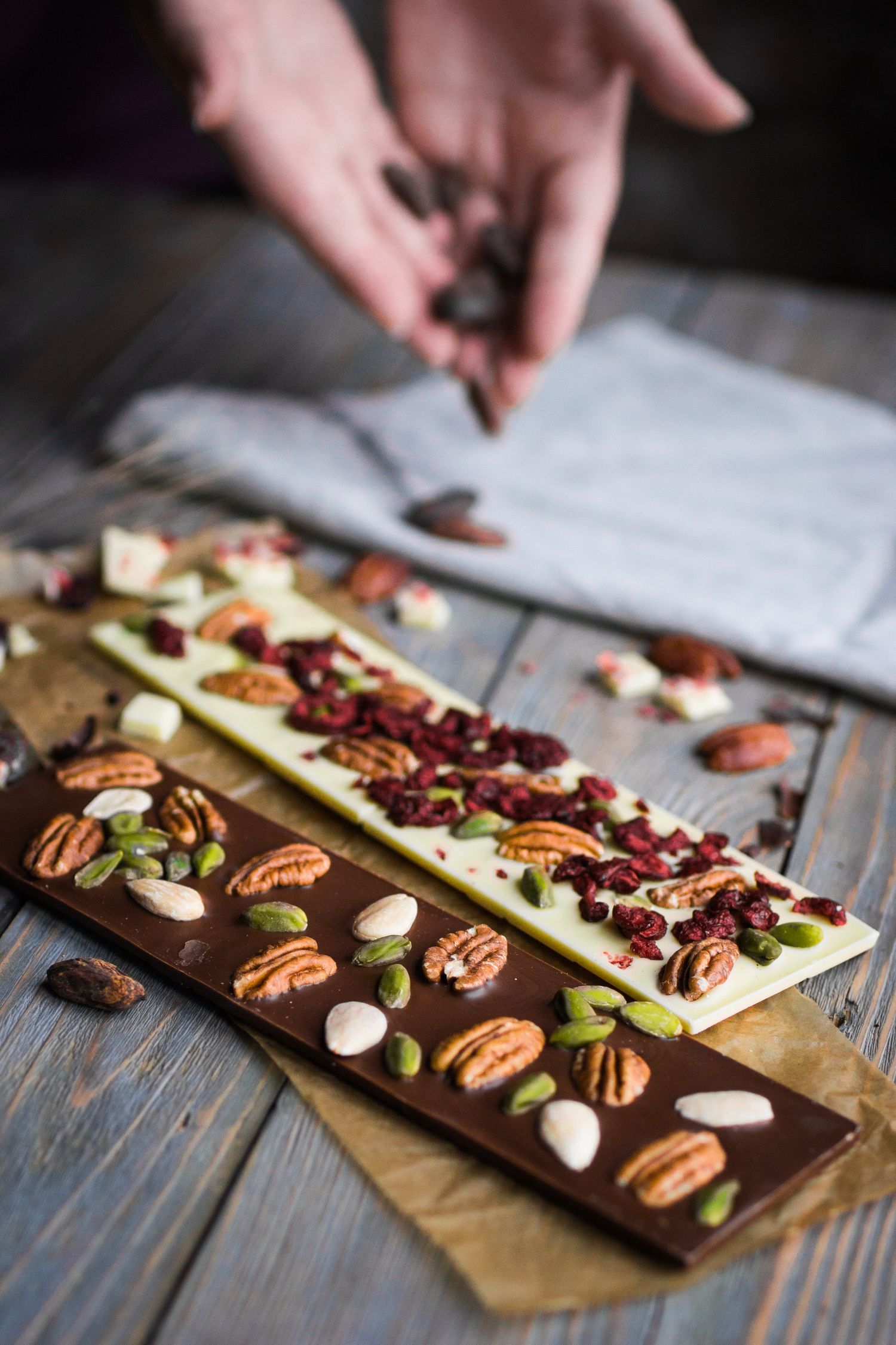 Artisan chocolate bars loaded with pecans, pistachios, almonds and dried cranberries