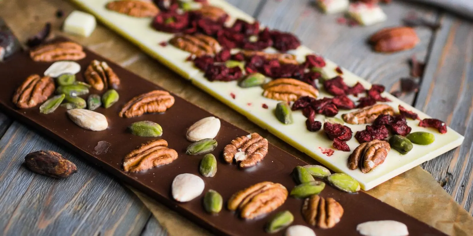 Artisan chocolate bars loaded with pecans, pistachios, almonds and dried cranberries