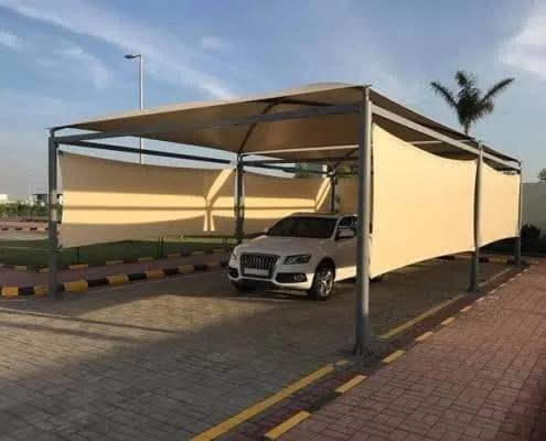 تركيب مظلات سيارات قماش بي في سي بتصميم متين مع جوانب في جدة درع المملكة للمظلات