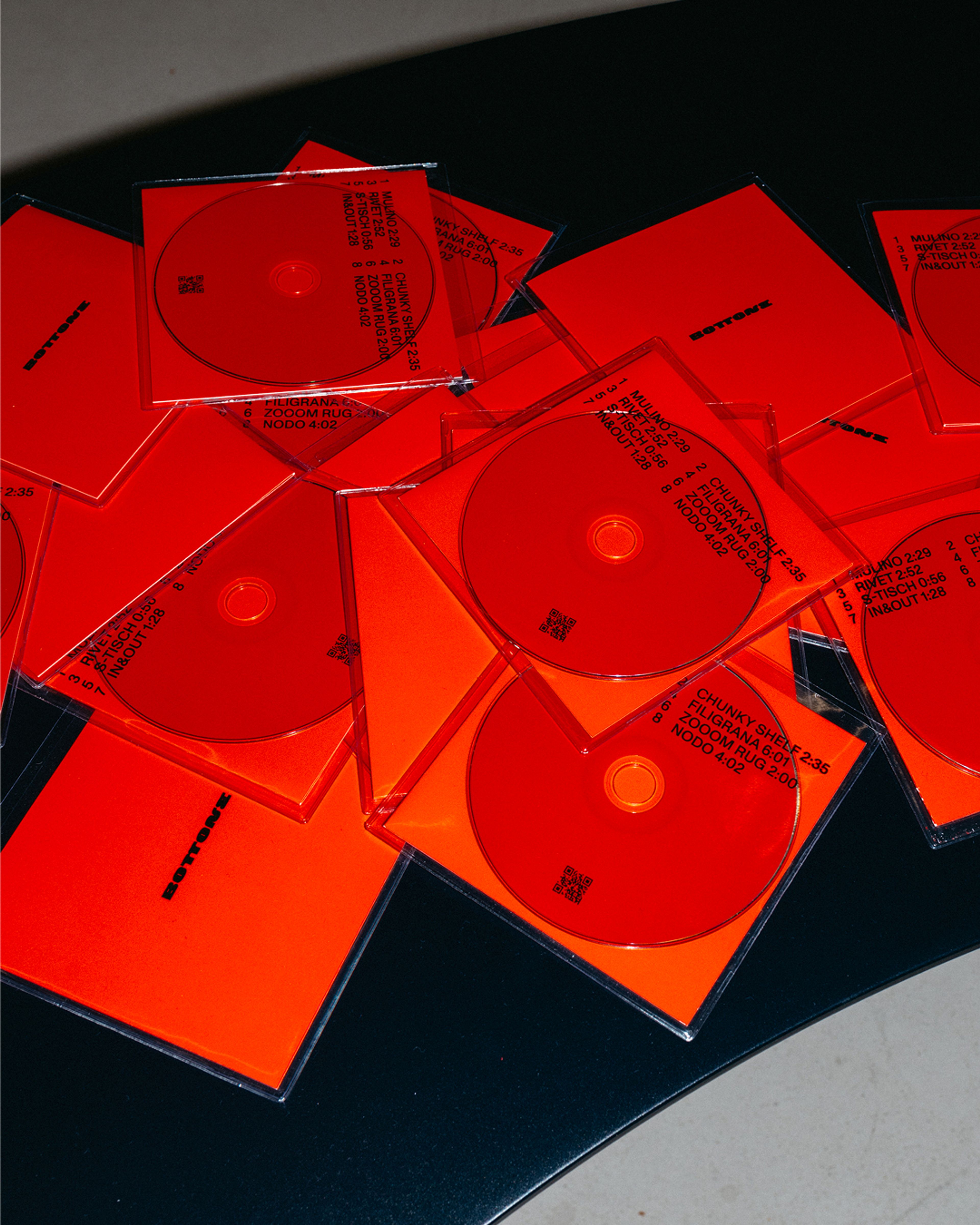 Invitation and CD packaging for furniture brand Bottone by Seasonal Fruit