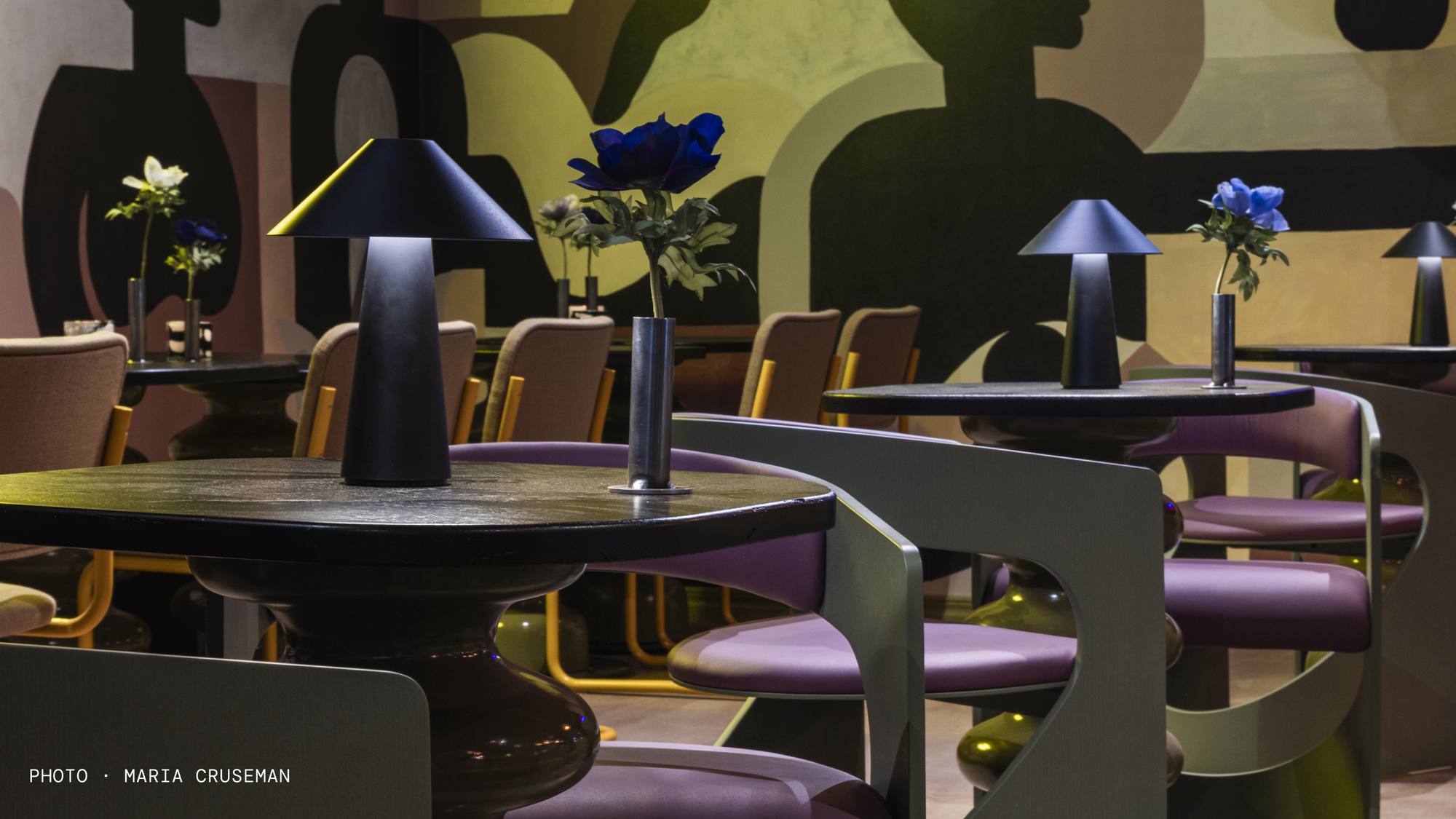 Sonoro: murals, purple seats, table lamps