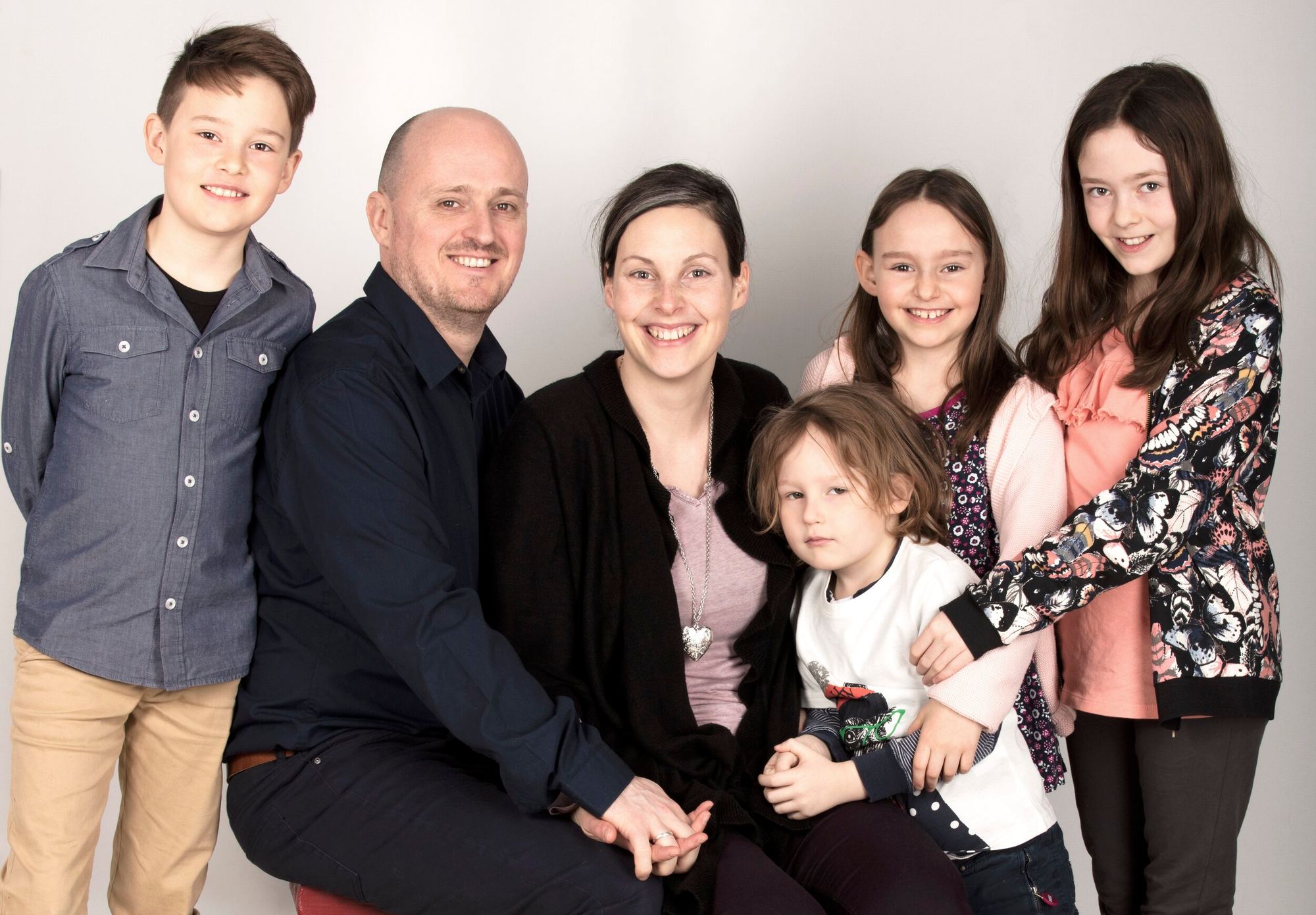 Familjeporträtt i studio