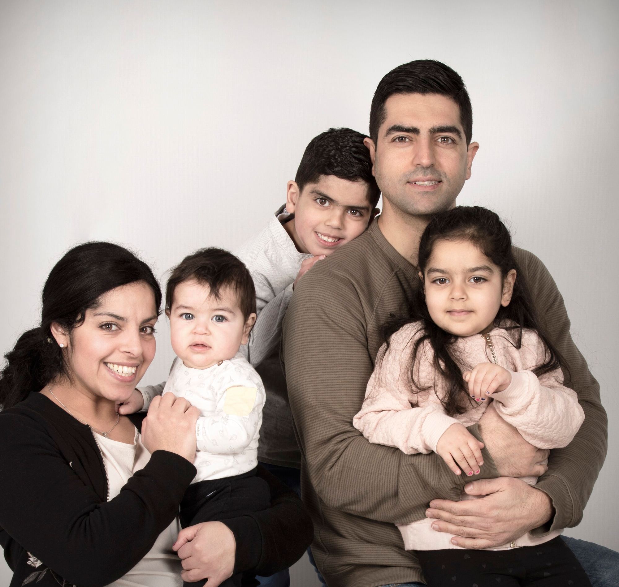 Familjeporträtt i studio
