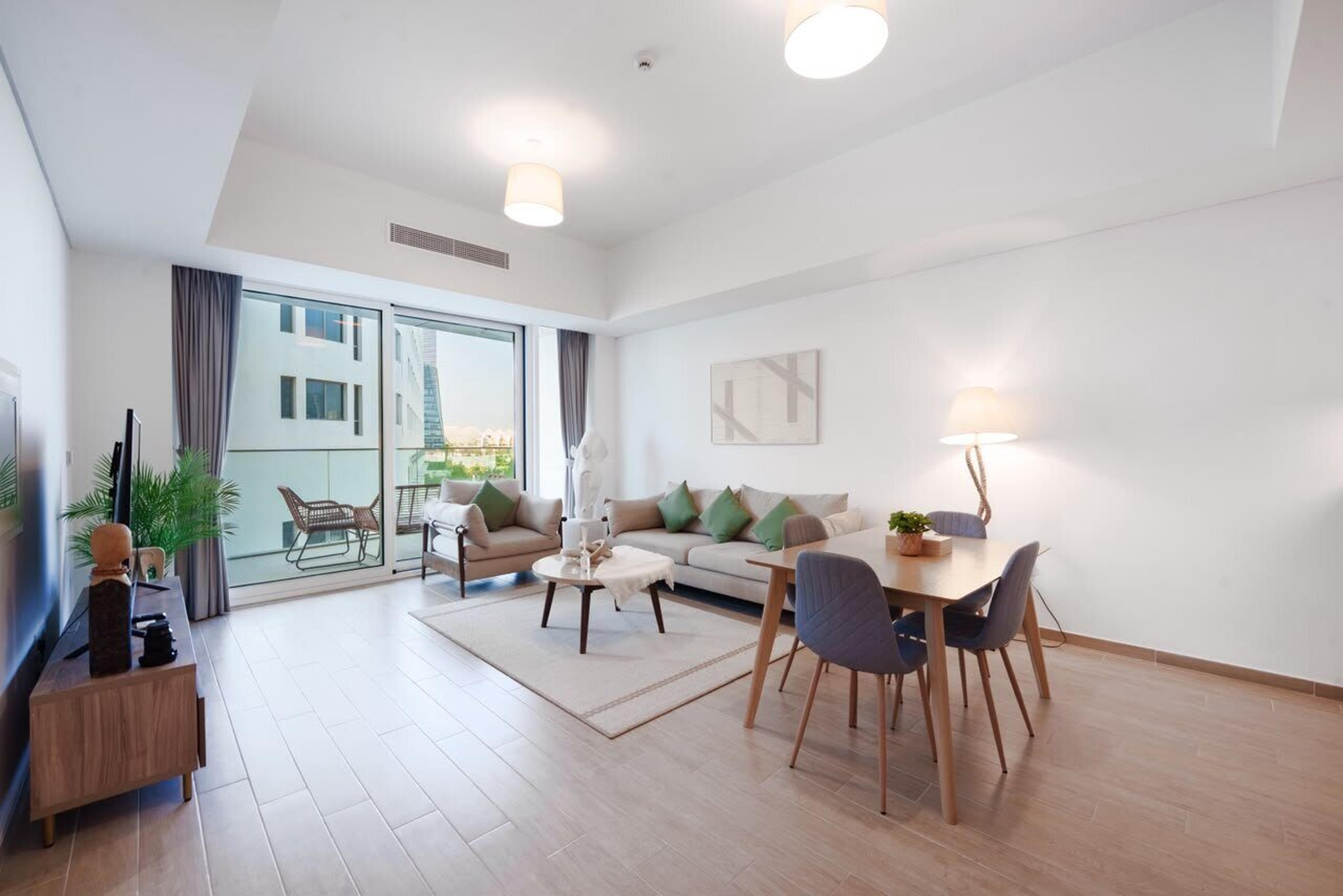 Living and dining room opening onto the balcony