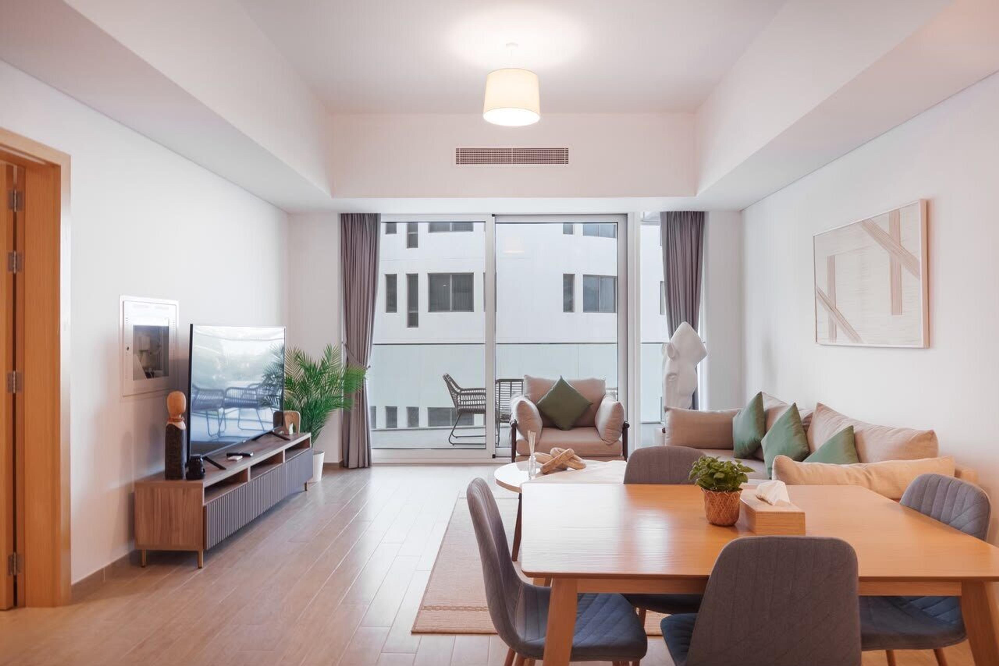 Dining table by the balcony doors