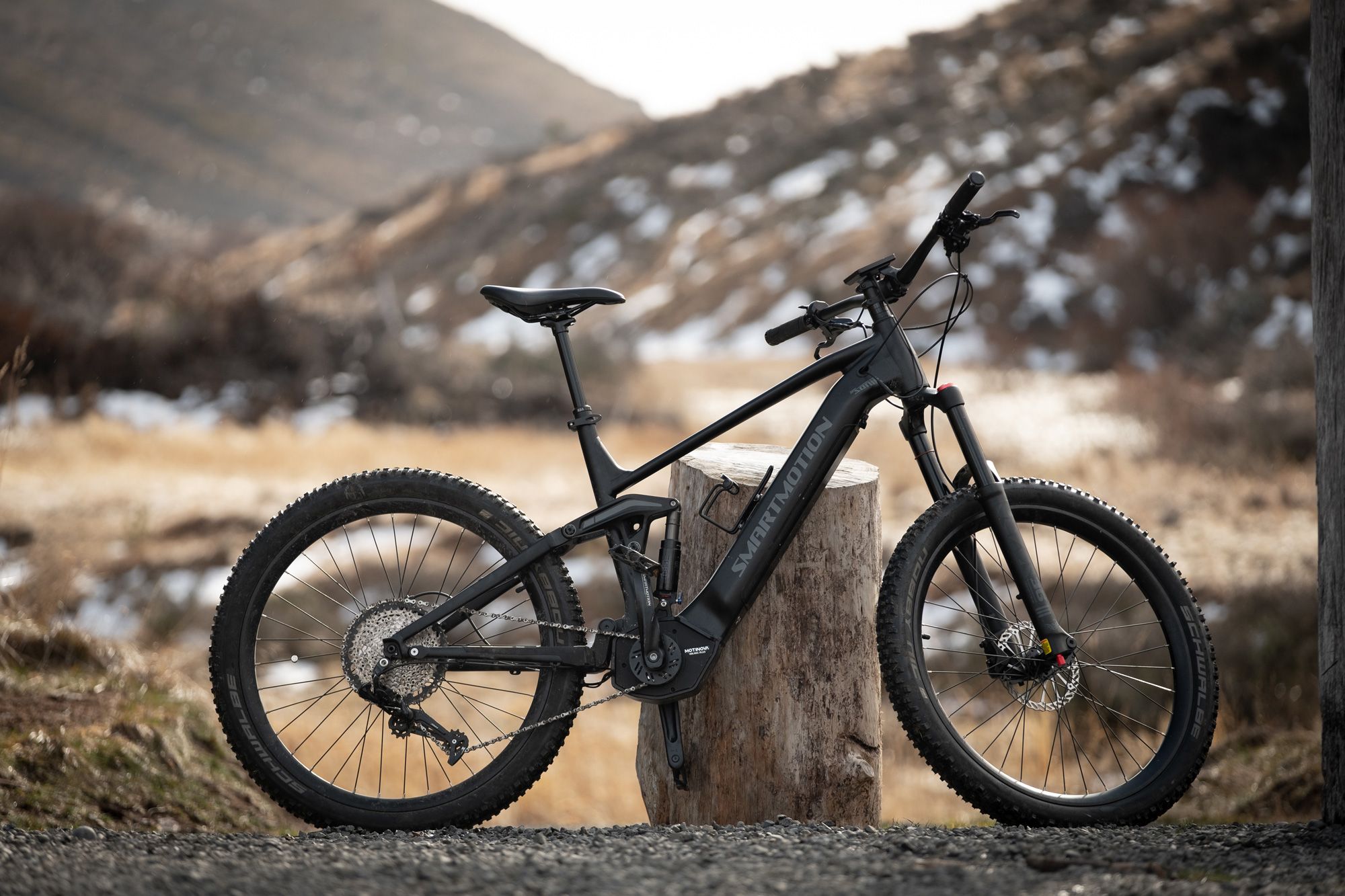 The best electric trail bike, parked on a fence.