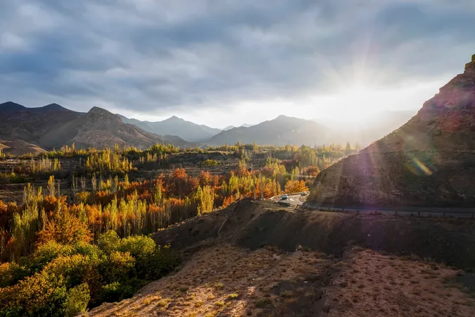 Sun rays over hills