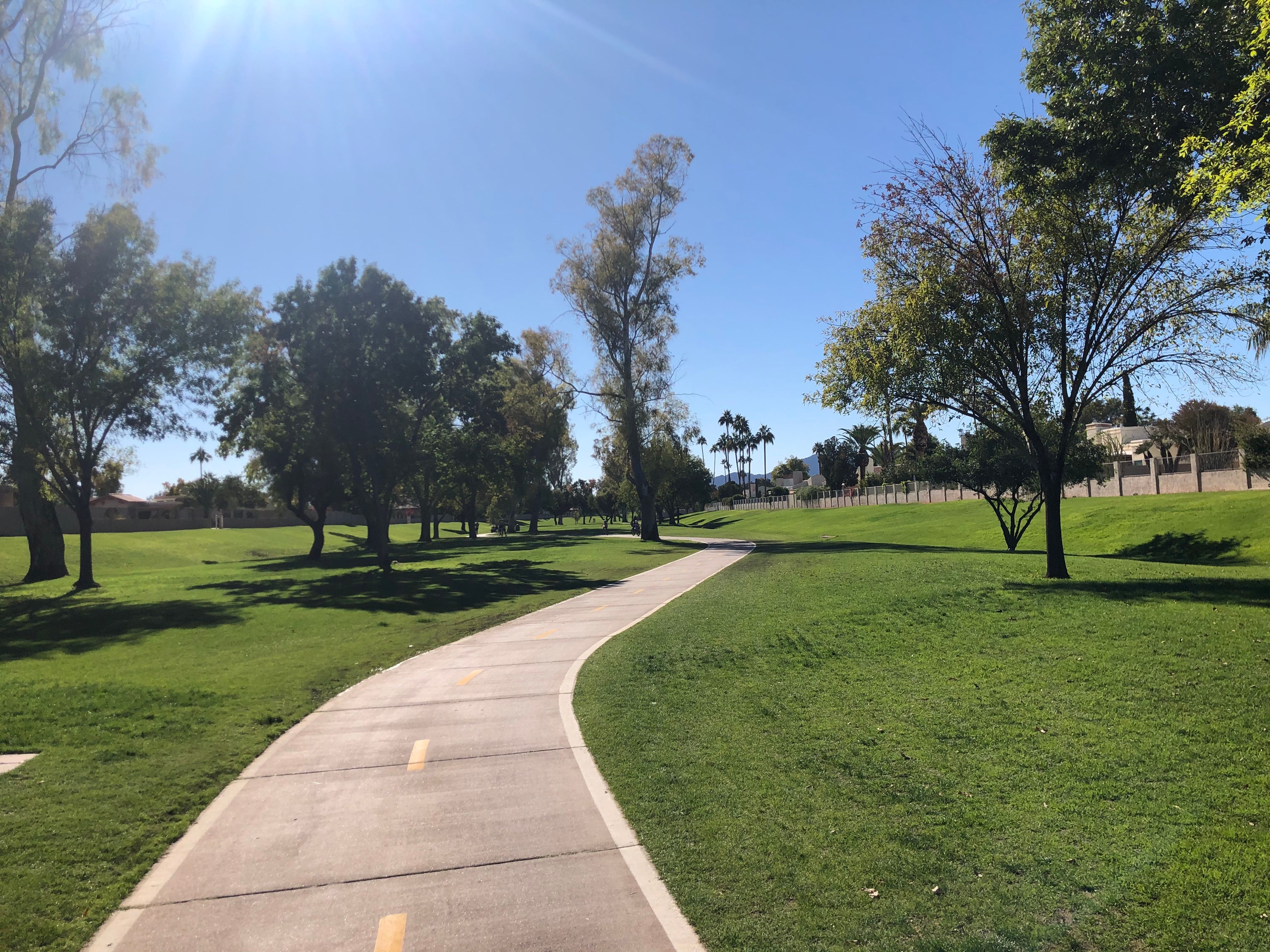 Greenbelt trail in sunlight