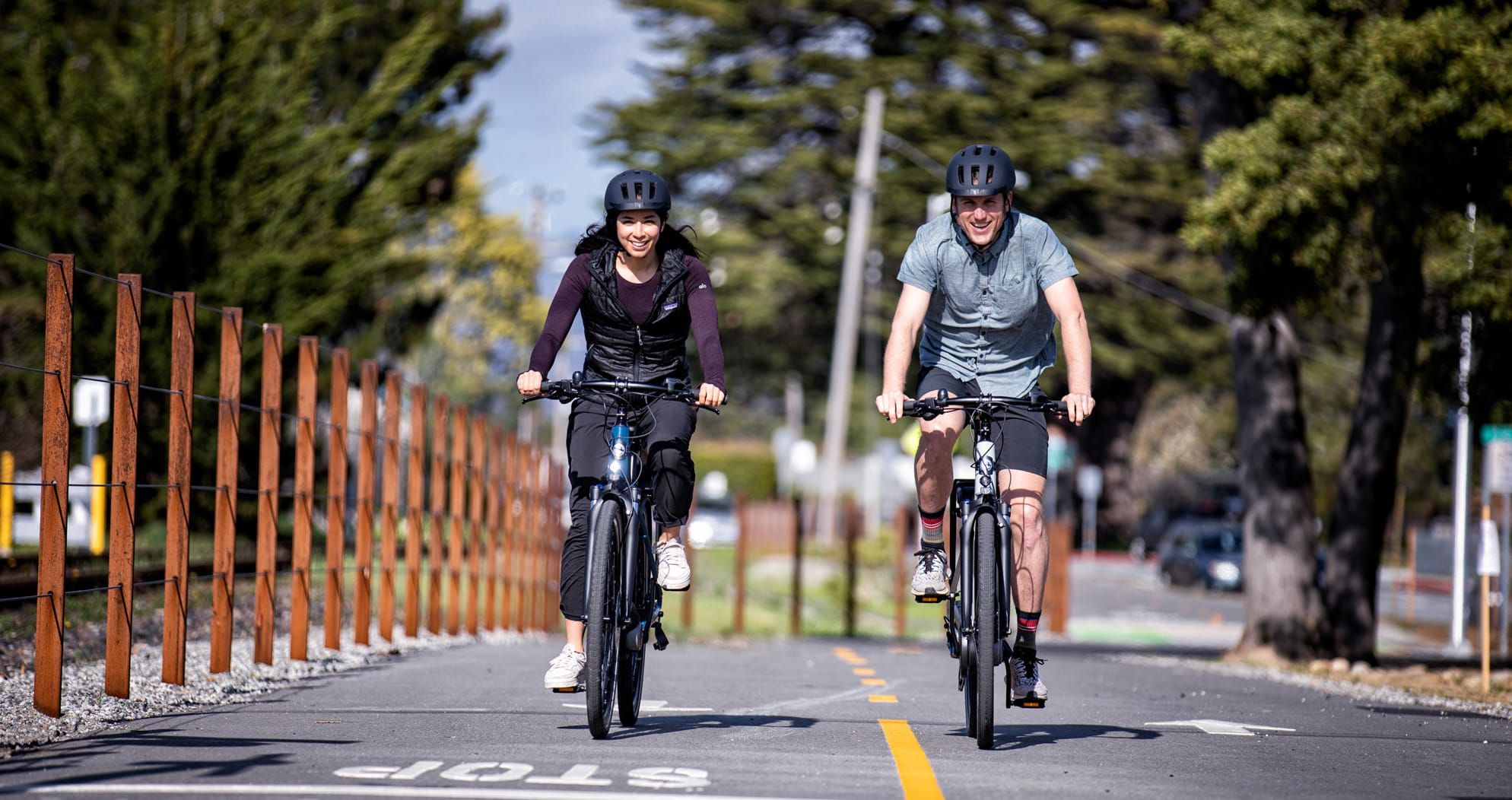 two people biking for their health