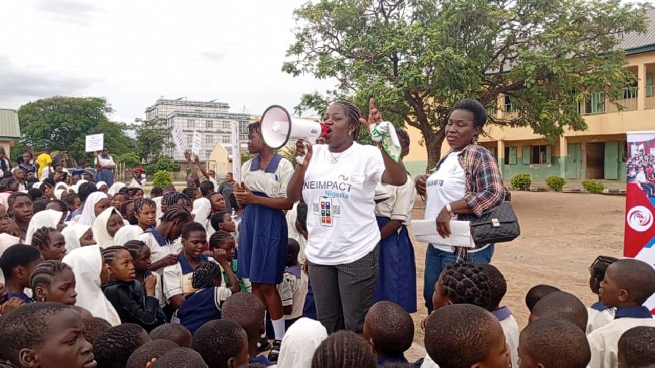 DHDC staff and partners conducting school awareness and sensitisation.