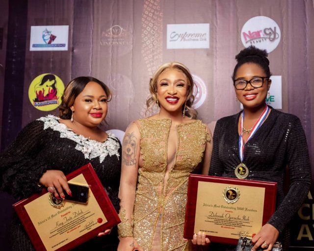 DHDC Executive Director with King Tonto Foundation CEO at awards event.