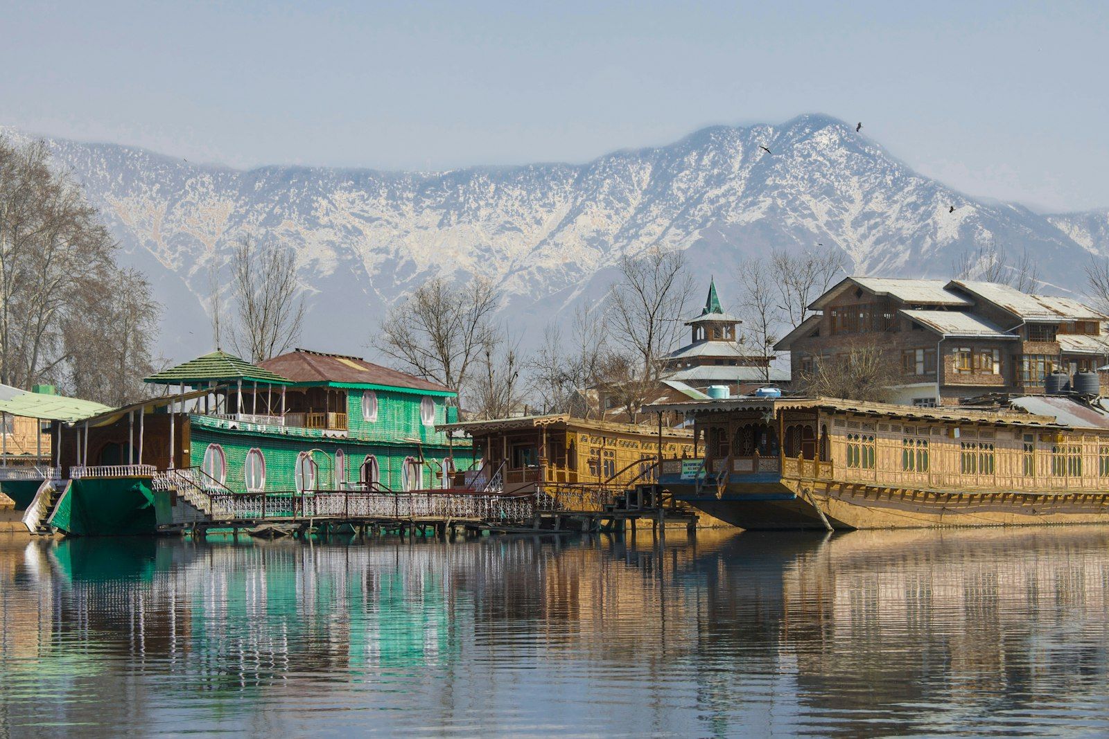 Kashmir — Dal Lake at dawn, apple orchards, Gulmarg snowfields - India's most beautiful