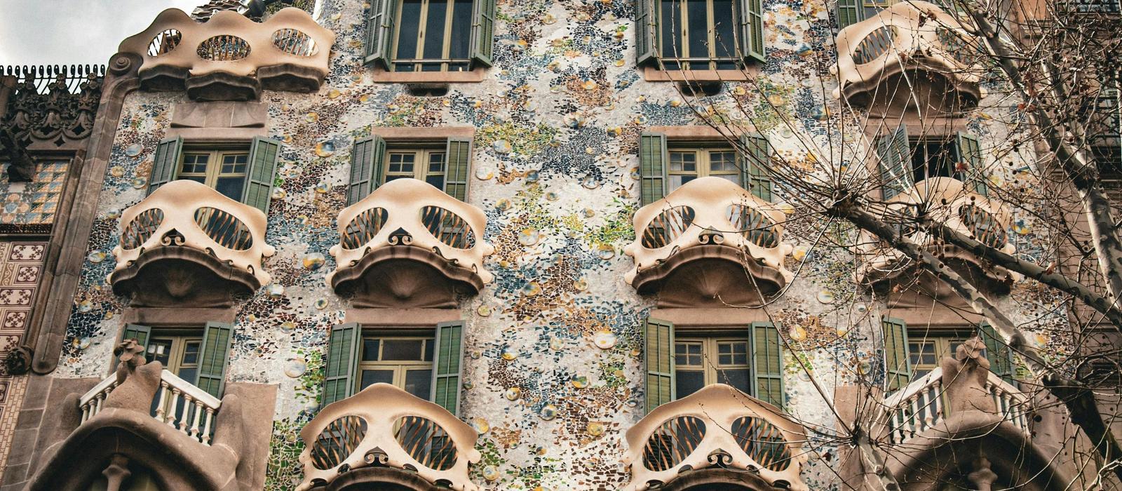 The colorful mosaic façade of Casa Batlló on Passeig de Gràcia