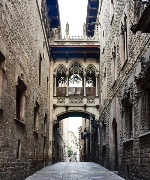 Narrow medieval streets and stone archways in the Gothic Quarter