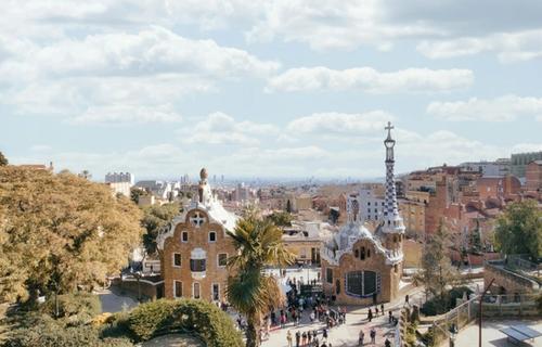 The colorful mosaic terrace and city view from Park Güell