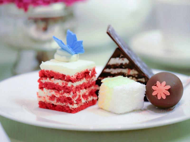 A plate with four different sweet treats