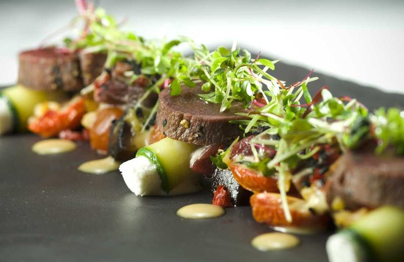 Springbok tataki and tartar, goat’s cheese, asparagus, pickled shiitake mushrooms, lemon preserve and sesame seeds