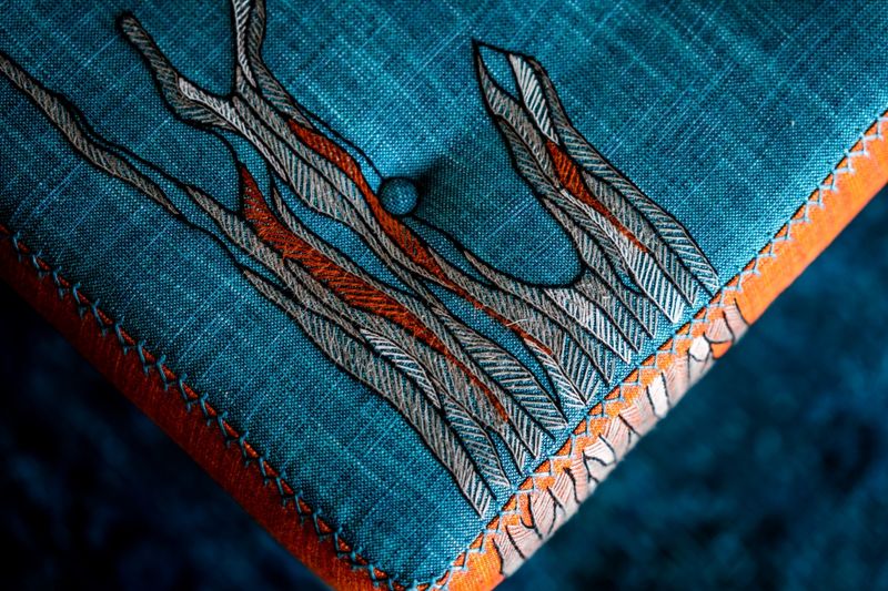 Close up image of detailed embroidery