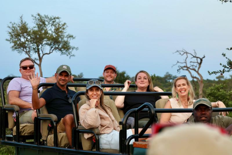 Rhino Africa Travel Experts on a game drive vehicle on safari with Tanda Tula