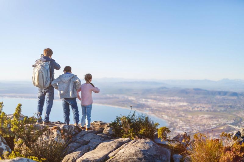 Three children hiking with their family in Cape Town