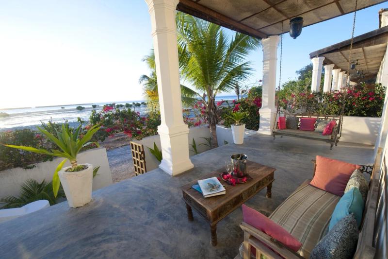 A view of a veranda looking out onto the Indian Ocean from Ibo Island Lodge