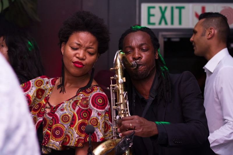 A saxophonist entertains Rhino X guests