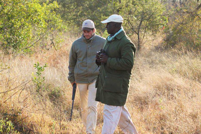 "Mark and Elmon tracking the lions..."