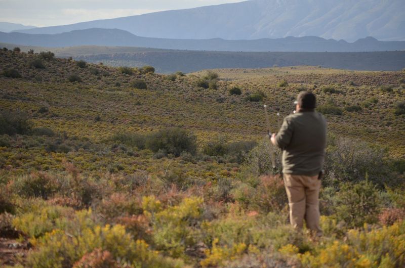 Guide looking out at Sanbona
