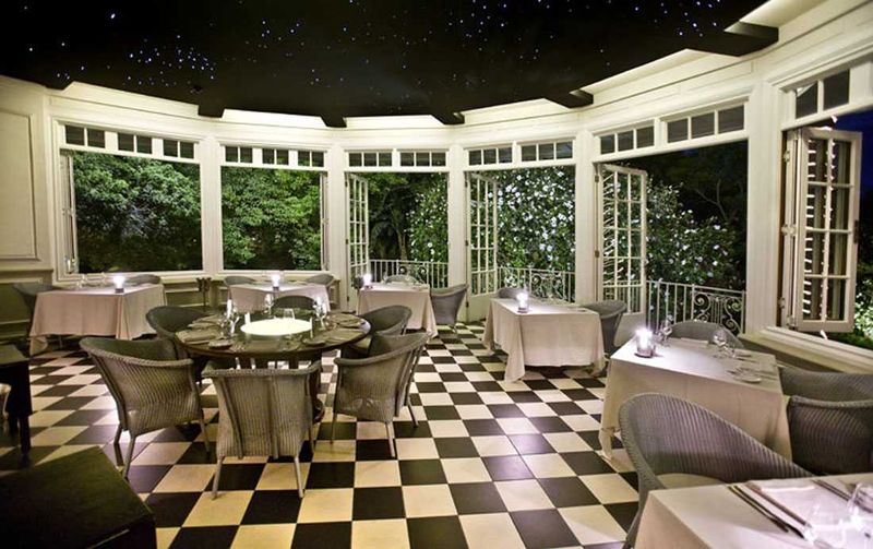 The gorgeous conservatory of the Mount Nelson Planet restaurant is transformed at night