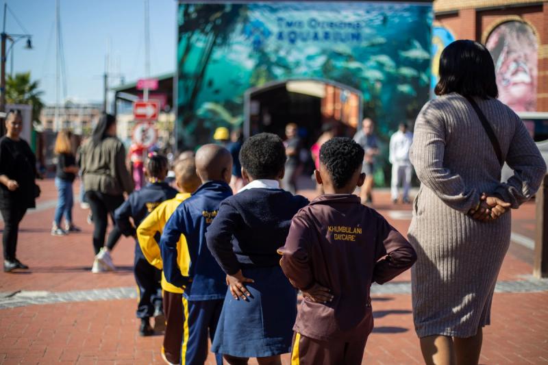 The angel children from Khumbulani on their best behavious while waiting to enter the aquarium