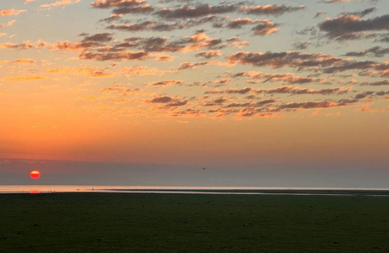 Orange sunset over the floodplains of Gorongosa National Park.