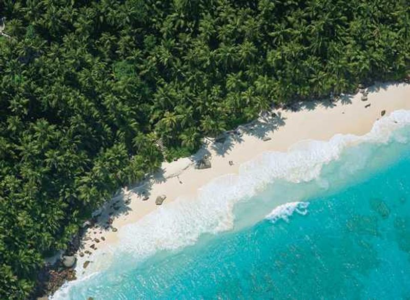 Take a stroll on fregate Beach in the Seychelles