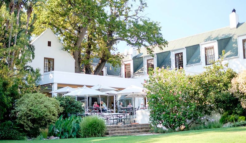 A lush garden and verandah