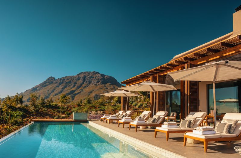Delaire Graff Owner's Villa mit Swimmingpool und Blick auf die Weinberge