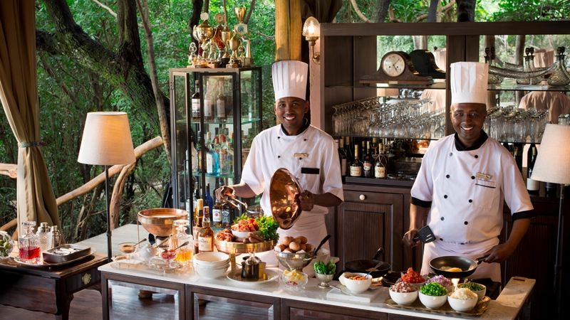 Passionate chefs preparing food at one of the Maasai Mara lodges