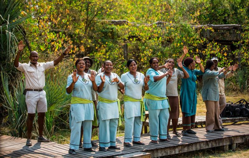 Lodge staff in Botswana singing a traditional greeting song