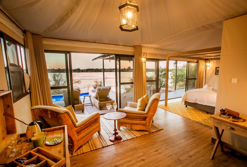 Spacious tented suite overlooking the Zambezi River