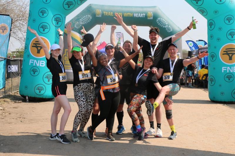 Our team of eight rhinos celebrating at the finish line
